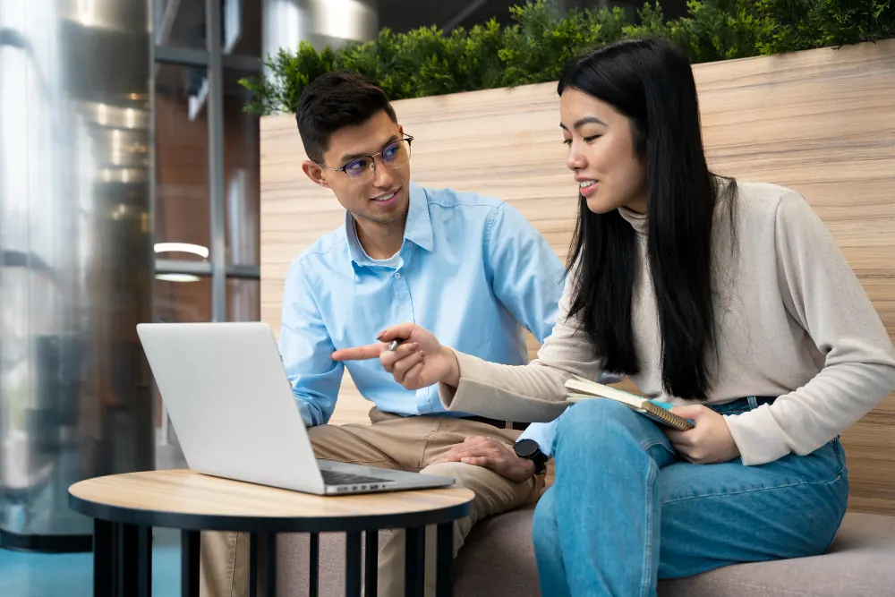 Students reviewing university options with a counsellor